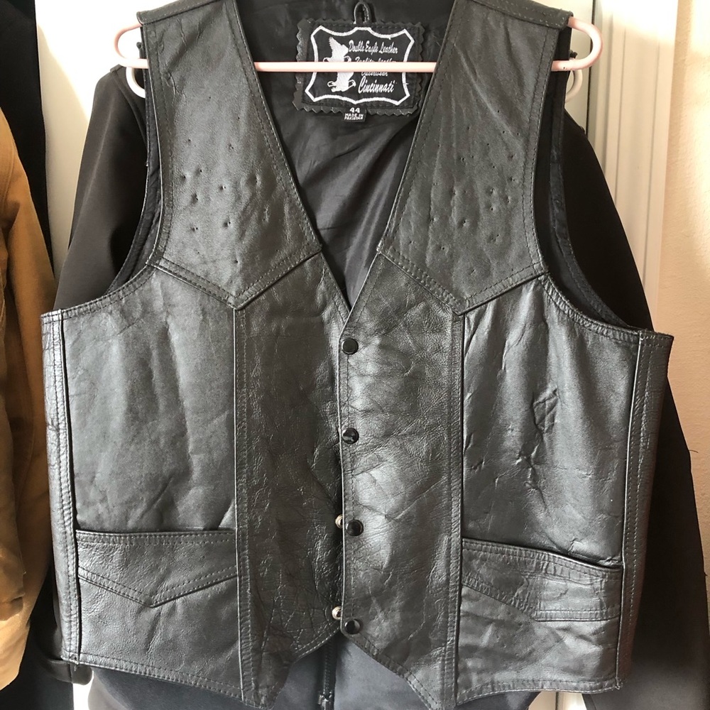 Leather vest.